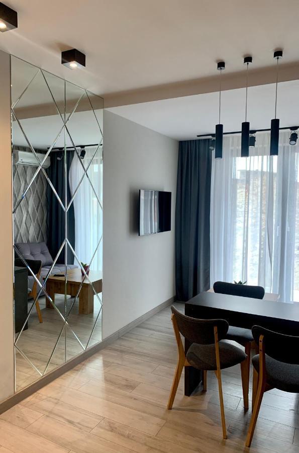 в новобудові в центрі з парковкою Apartment *